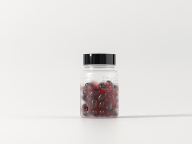 Reviewing Rhonda Patrick's Supplement Routine in 2025 4 Bottle of fish oil capsules