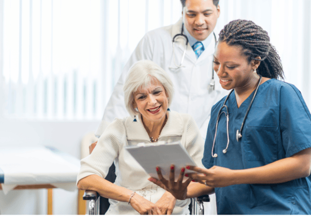 An image of an old woman consulting to doctors.