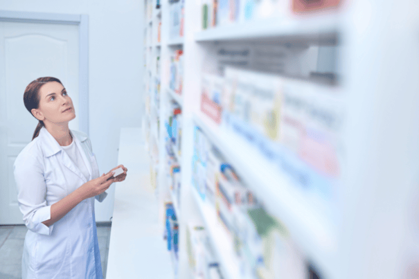 NMN and NR Compared: Better Together or Choose One? 9 An image of a pharmacist looking at supplements