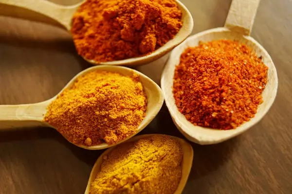 Choosing a High Quality Turmeric Supplement: Buyer's Guide 4 a group of spoons with different spices