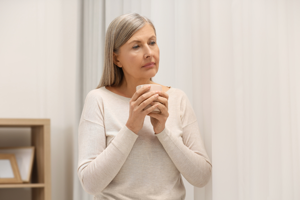 Does NAD+ Help With Menopause Symptoms? 6 An image of an aging woman suffering from menopause