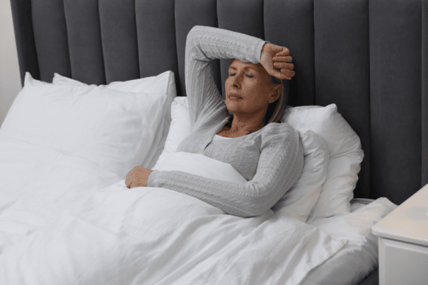 Does NAD+ Help With Menopause Symptoms? 7 An image of an aging woman suffering from menopause