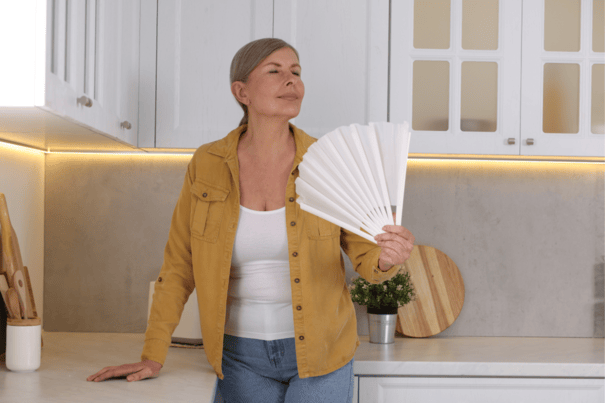 Does NAD+ Help With Menopause Symptoms? 8 An image of an aging woman suffering from menopause
