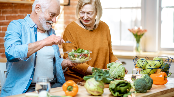 What Are Sirtuins and What Is Their Role in Aging? 10 An image of an old man and woman preparing healthy foods