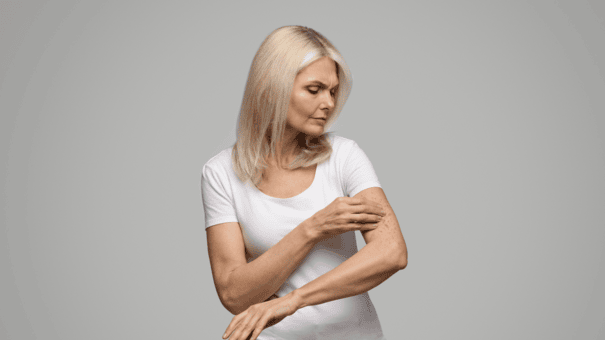An image of a matured woman with flushing or warmth in the skin