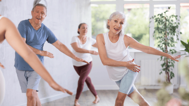 An image of a matured men and women exercising