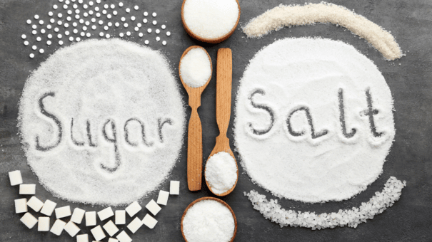 12 Diet and Lifestyle Secrets of Centenarians Who Live to 100 6 An image of salt and sugar