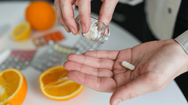 NMN vs. Niacin: Safety and Efficacy for Longevity 8 An image of supplements.
