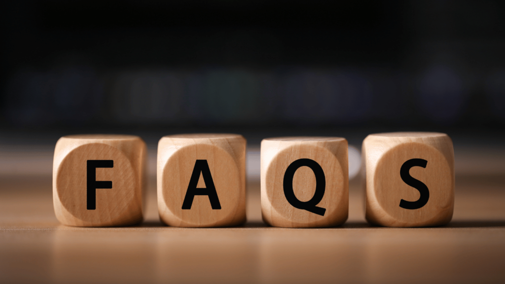 An image of wooden blocks written with FAQS