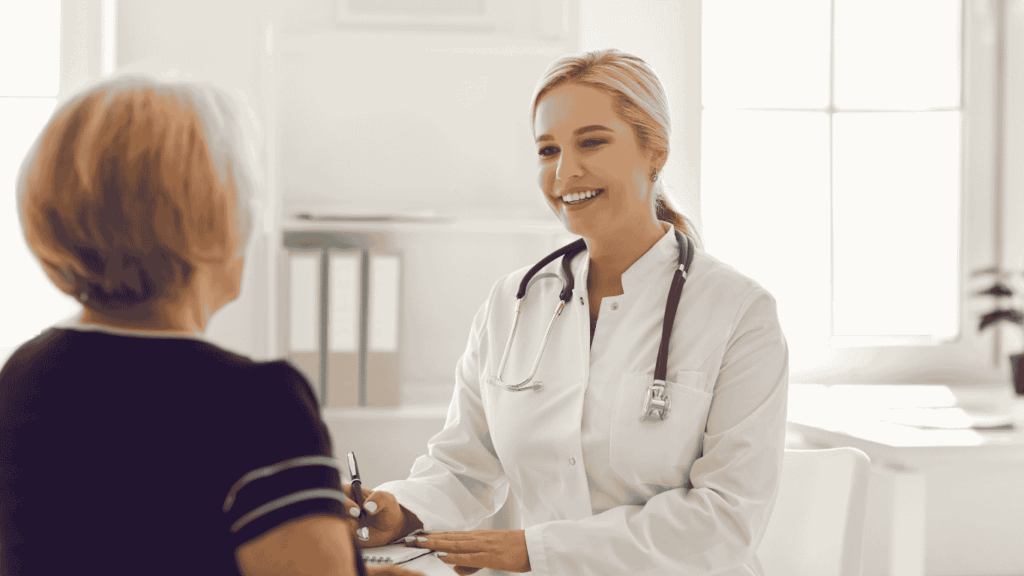 An image of a matured woman consulting a doctor