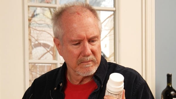 Why Take Quercetin with Bromelain? 7 Health Benefits to Know 10 An image of a man reviewing a supplement