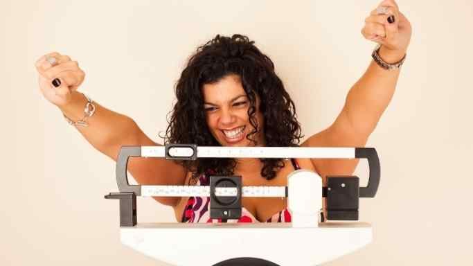 A Guide to NMN and Weight Loss 9 An image of a woman on a weight loss journey
