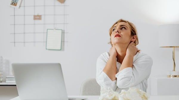 Cellular Degeneration: What It Is and Why It Matters 5 An image of a woman appearing stressed