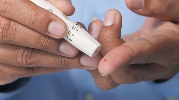 An image of a pinprick blood sample test