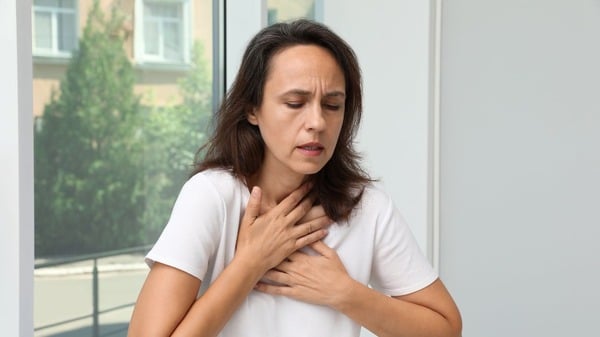 An image of a woman suffering from the effects of oxidative stress