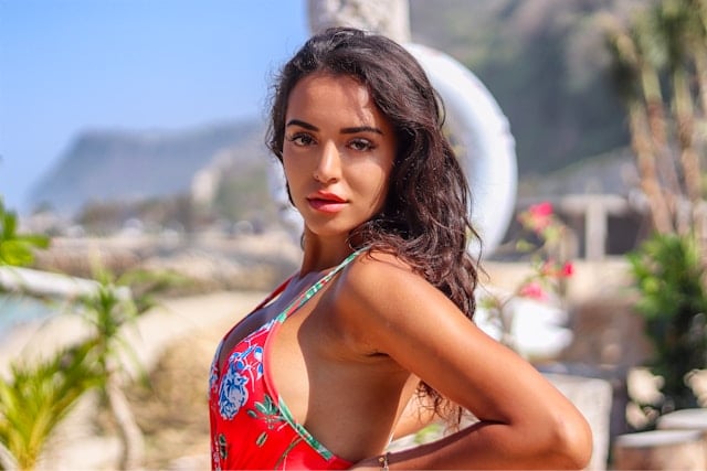 5 Surprising Health Benefits of Quercetin You Need to Know 6 A healthy looking woman on the beach