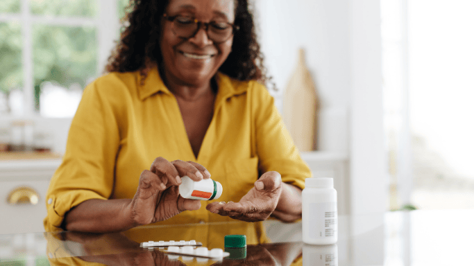 5 Antioxidant Supplements for Oxidative Stress Relief 8 An image of a woman taking supplement