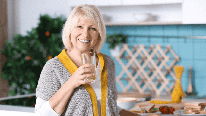 An image of a woman drinking water. 