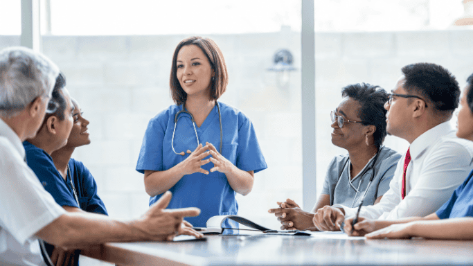 An image of health professionals in a meeting