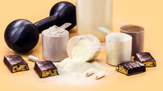 An image of creatine, snack, milk and dumbbell