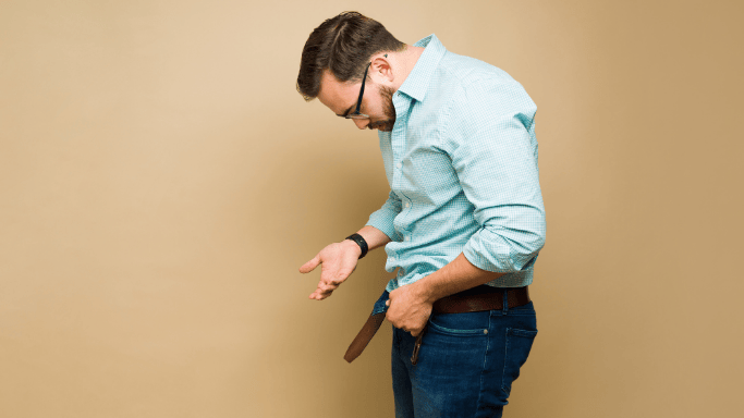 What to Know About Creatine and Sexual Health 6 An image of a man in long sleeves looking downwards