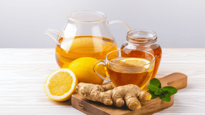 5 Anti-Inflammatory Health Benefits of Ginger Root 12 An image of ginger tea, lemon, and a ginger