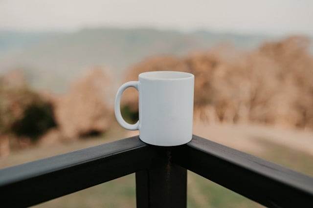Should You Take Creatine and Caffeine Together? 6 A cup of coffee on a balcony