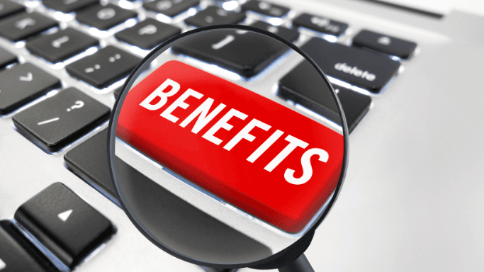 8 Ways to Boost Your Glutathione Levels Naturally 5 An illustration showing a magnifying glass focusing on a red keyboard key labeled “BENEFITS".