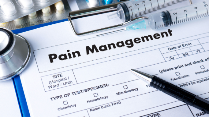 NSAID Alternatives: 11 Non-NSAID Pain Relievers to Consider 10 A close-up of a medical clipboard with a form labeled “Pain Management,” surrounded by a stethoscope, syringe, pen, and blister packs of pills, representing approaches to managing pain.