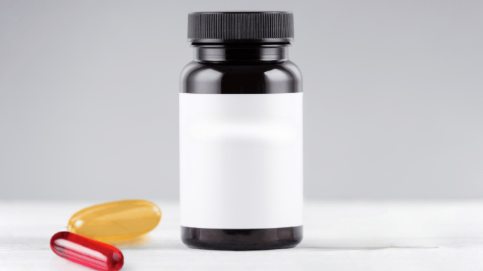 Glutamine vs Creatine: Science-Based Comparison 4 An image of two supplements beside a cannister