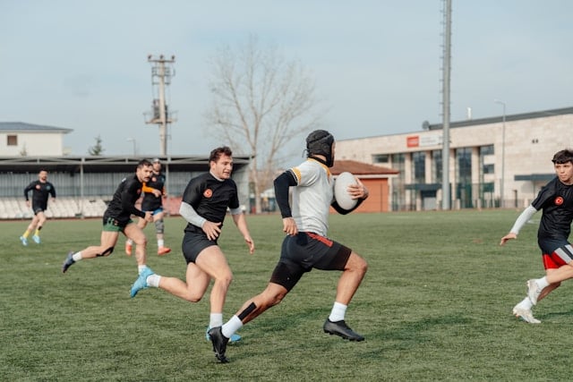 Does Creatine Increase Testosterone Levels? 4 Rugby players on a field.