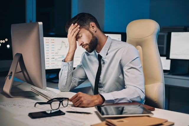 Why Creatine Causes Headaches and How to Prevent It 5 A man with a headache from taking too much creatine.