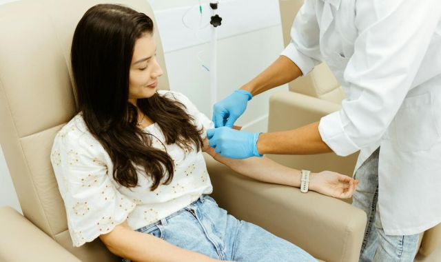 How to Increase Ferritin Quickly: 7 Evidence-Based Strategies 3 woman blood test on period 53aeb59a