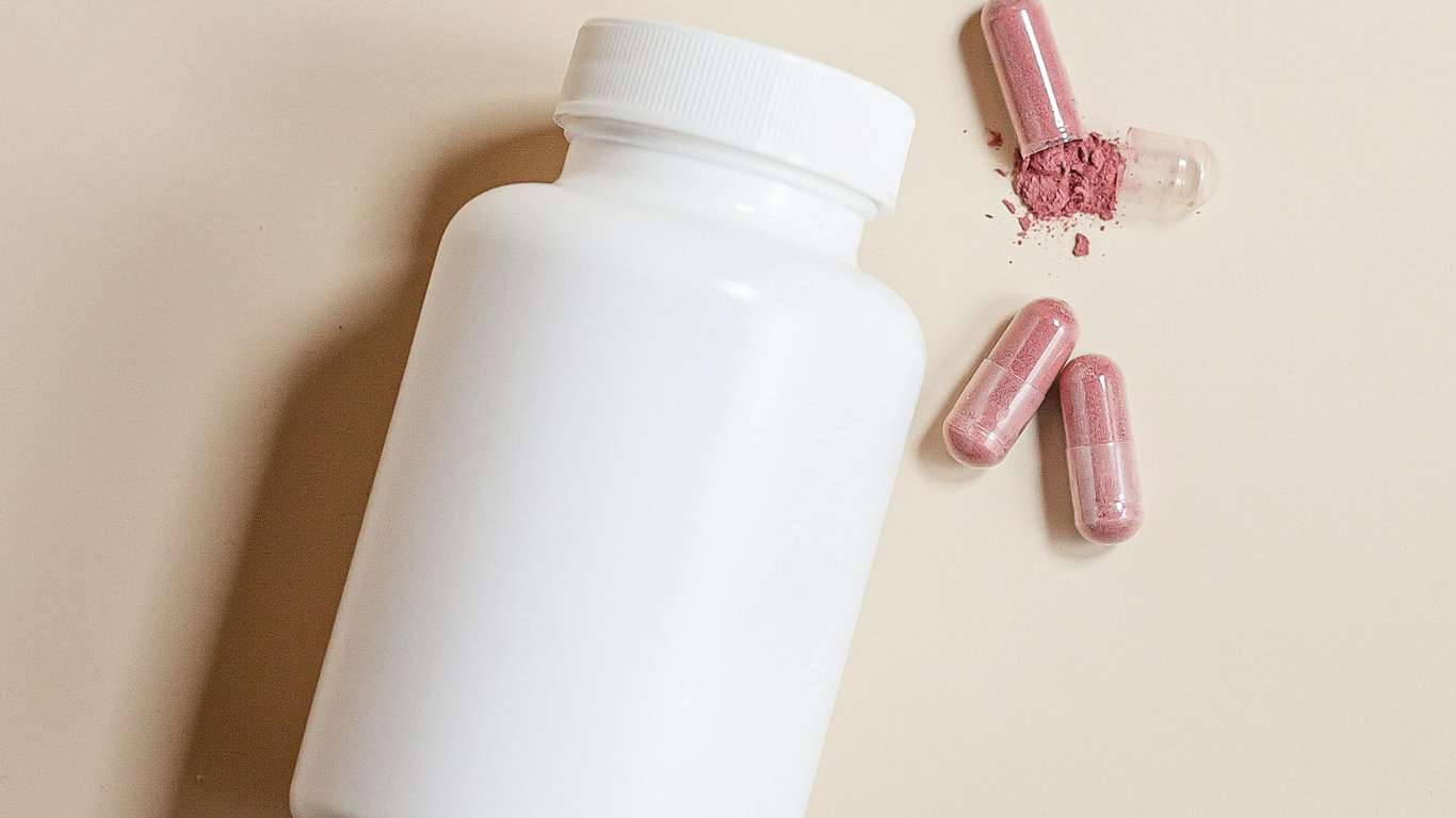 An image of a cannister beside a supplement