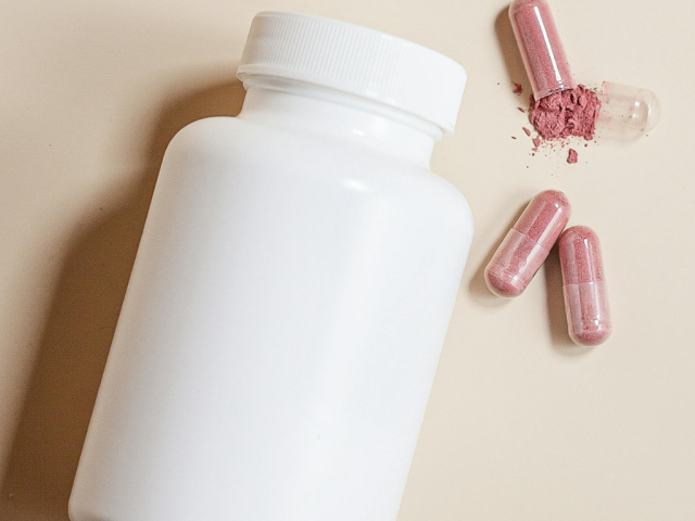 An image of a cannister beside a supplement