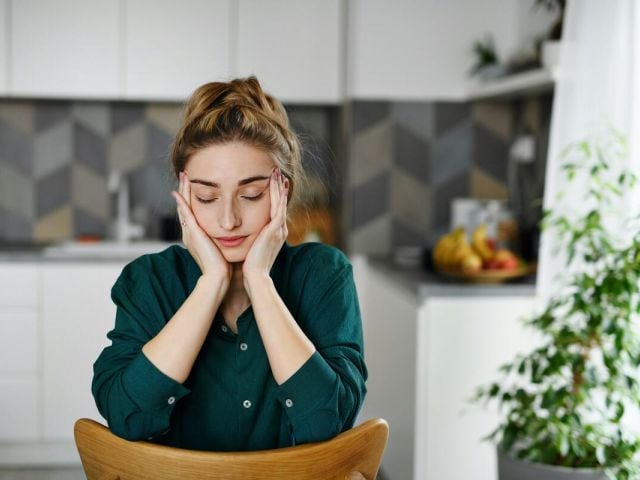 A woman still feels tired after 8 hours of sleep
