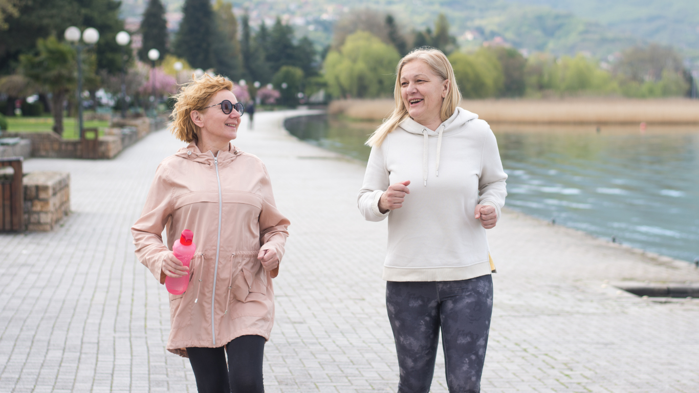 A picture of two healthy matured women running