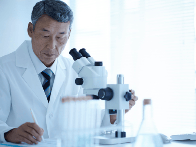 An image of a doctor having a medical experiment