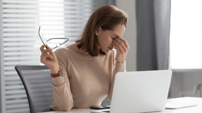 An image of a woman suffering from fatigue
