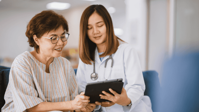 An image of a woman and a doctor