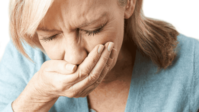A matured woman vomitting 