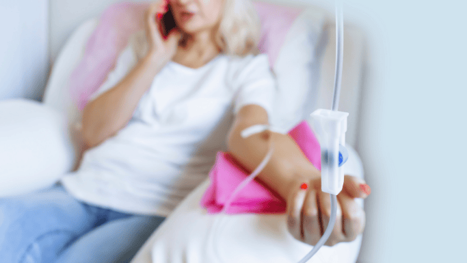 8 Ways to Boost Your Glutathione Levels Naturally 6 An image of a woman receiving intravenous glutathione therapy.