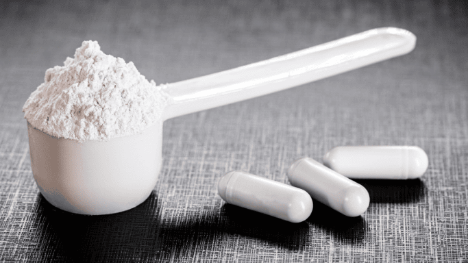 An image of creatine powder and supplement