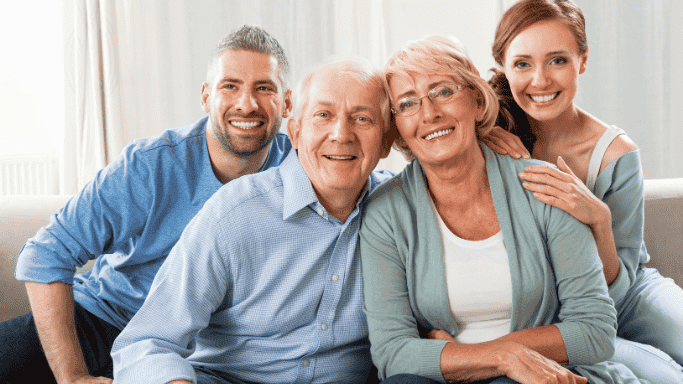 An image of four persons from different age group