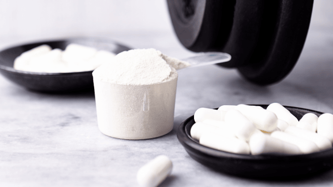 An image of creatine powder and creatine supplements

