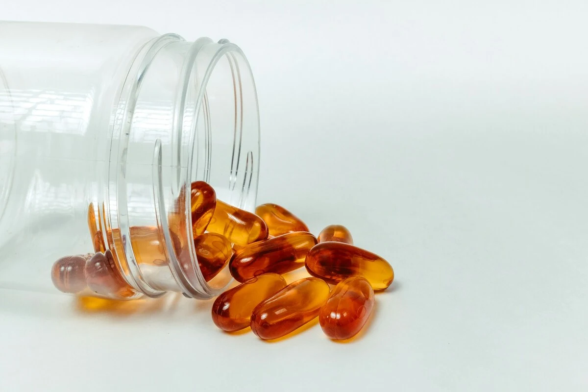 Liposomal NAD capsules on a white background.